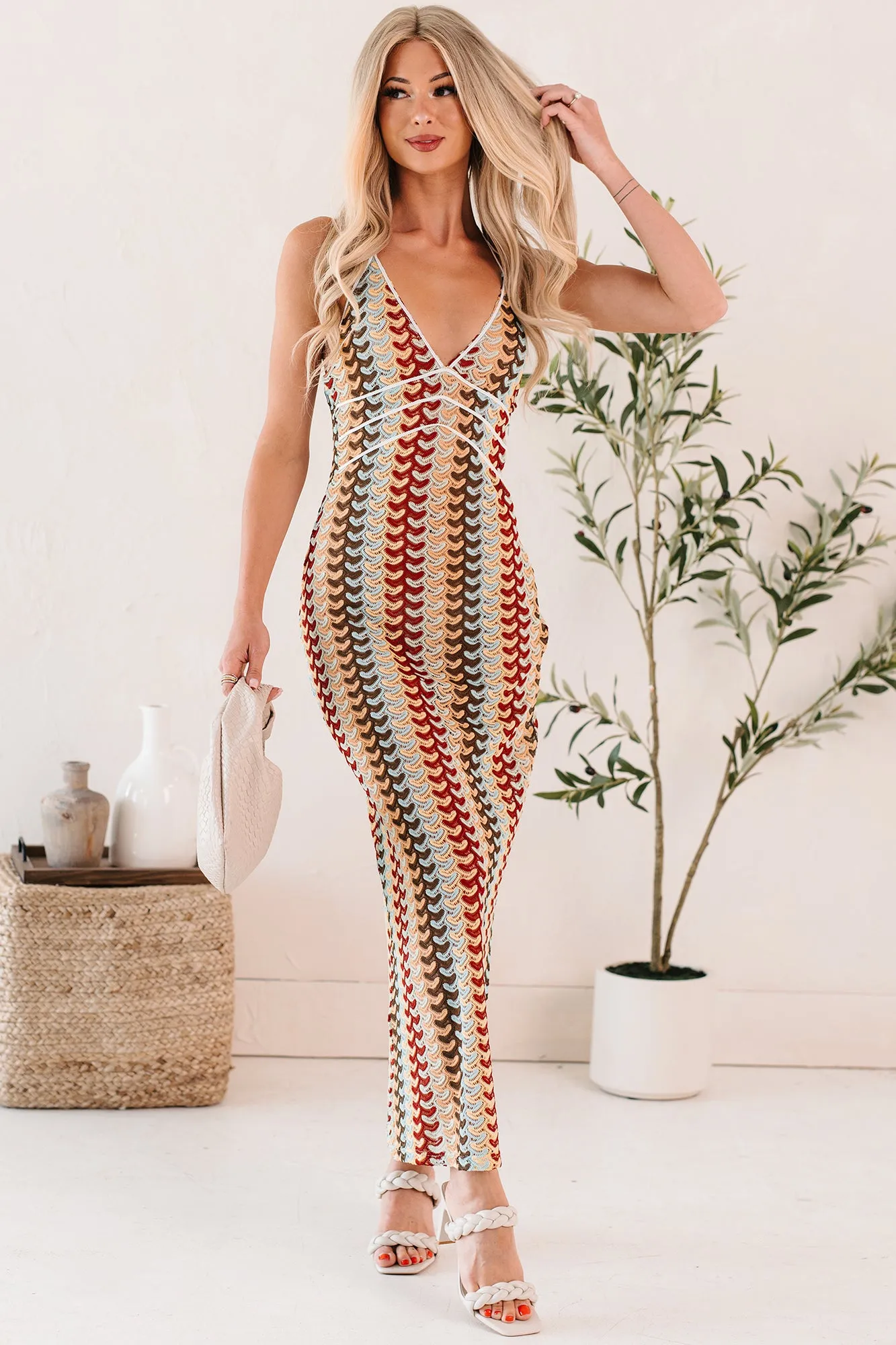 With its graceful design this dress creates a polished look for any occasion Sunglow State Crochet Halter Maxi Dress (Multi)