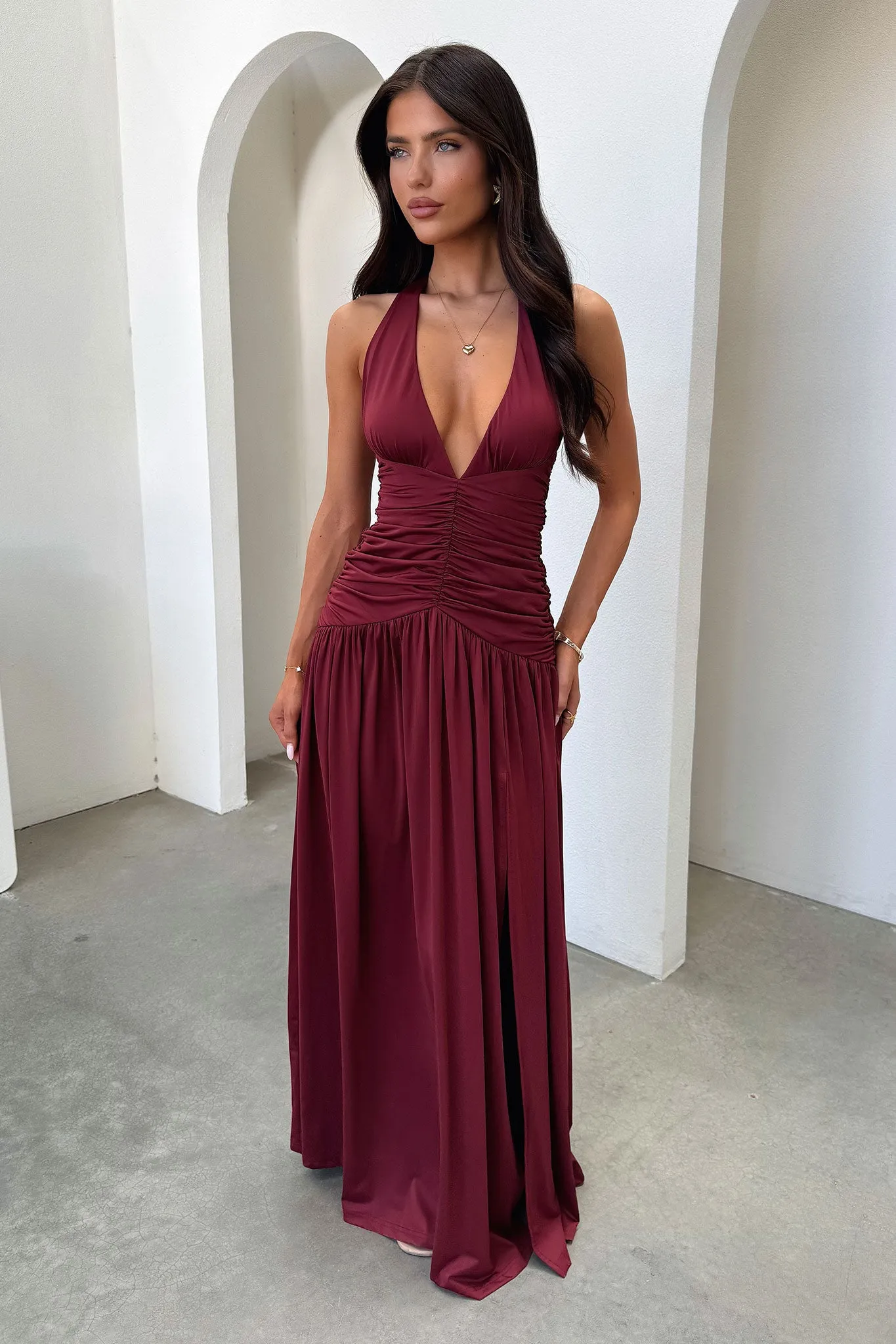 Ginevra Ruched Halter Maxi Dress - Burgundy This dress offers a comfortable and elegant fit that works for both casual and formal events