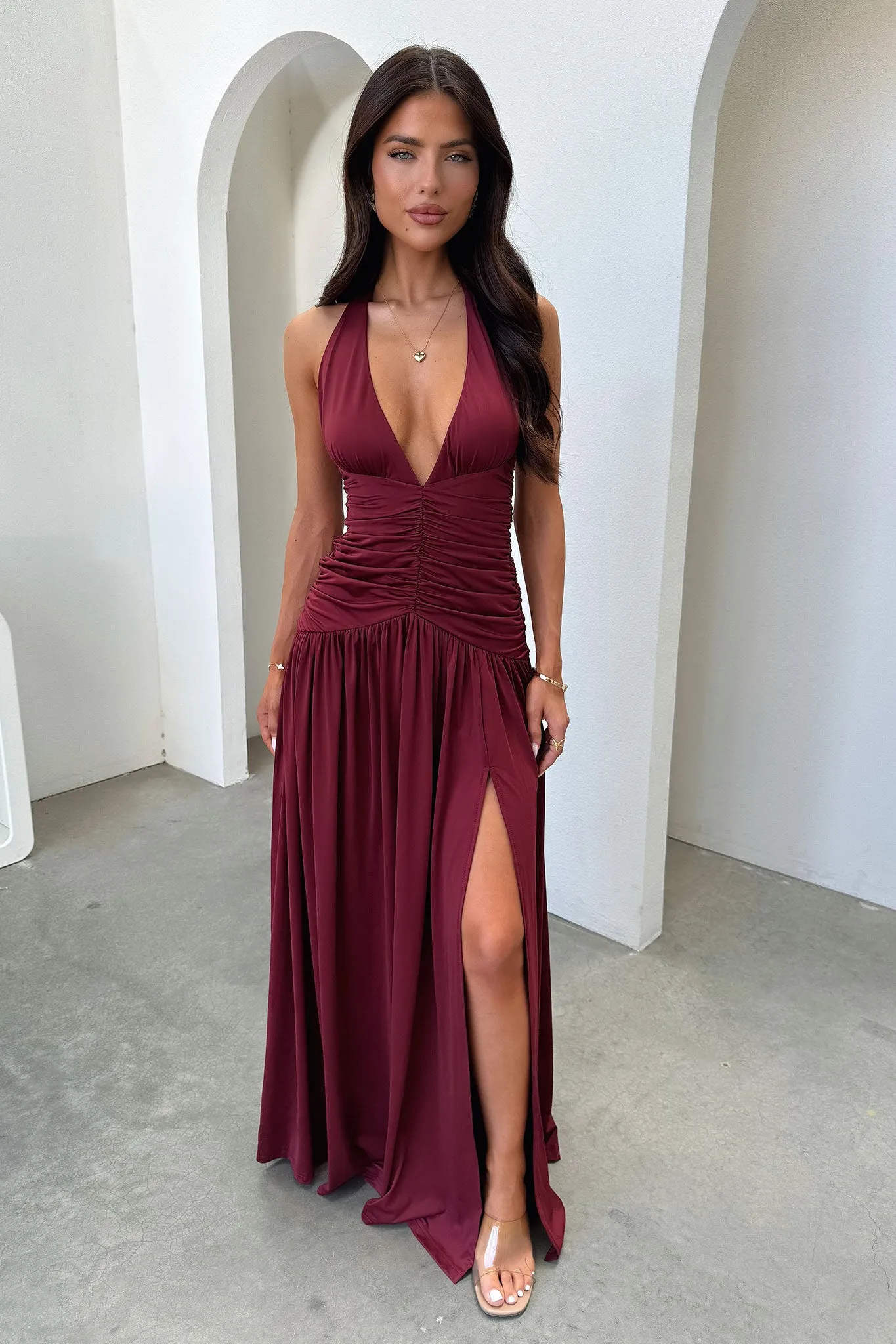 Ginevra Ruched Halter Maxi Dress - Burgundy This dress provides the ideal balance of style and comfort making it a wardrobe essential Roof View