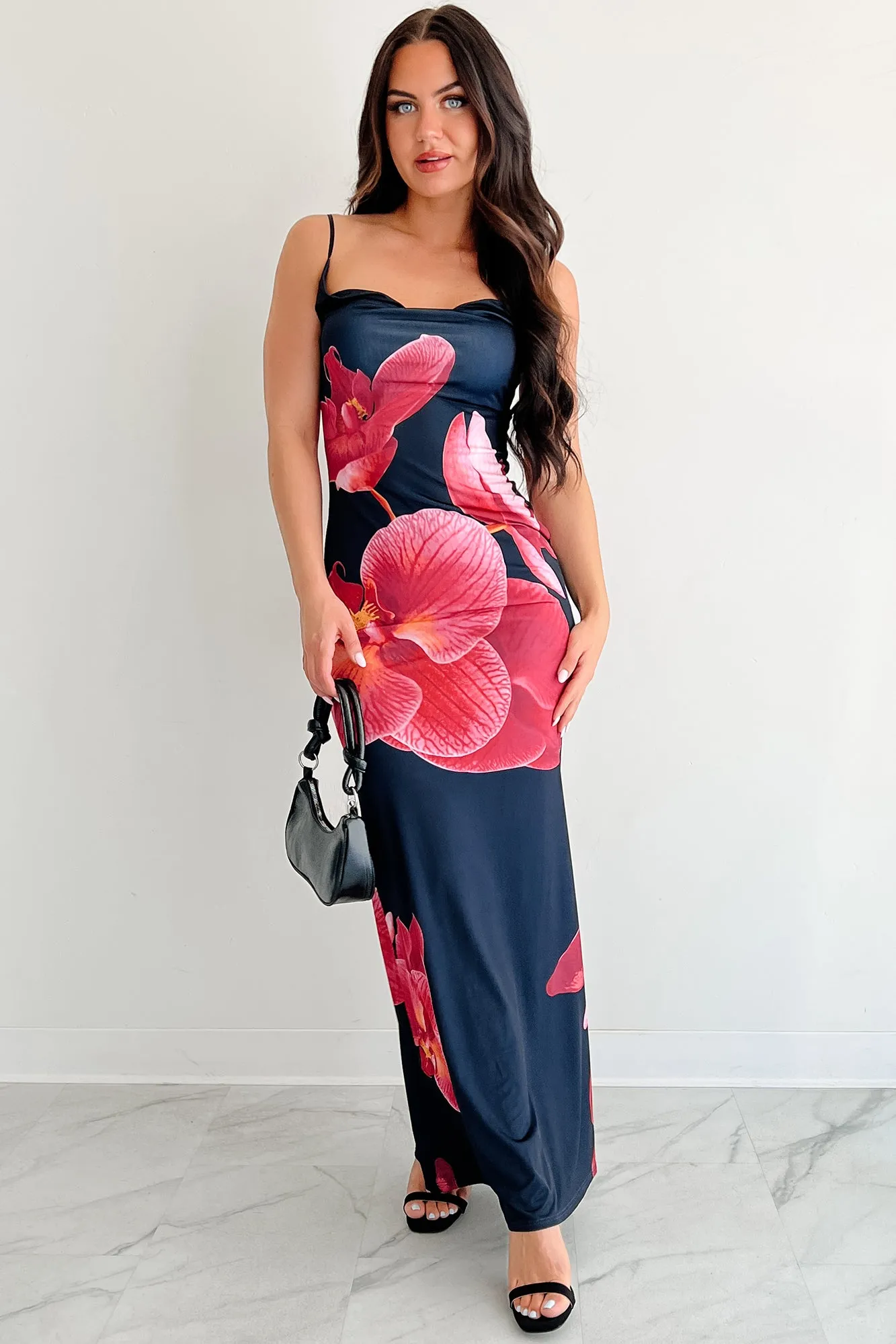 This maxi dress can be worn with a variety of shoes and accessories to create a unique look Call Me Maybe Sleeveless Floral Maxi Dress (Black)