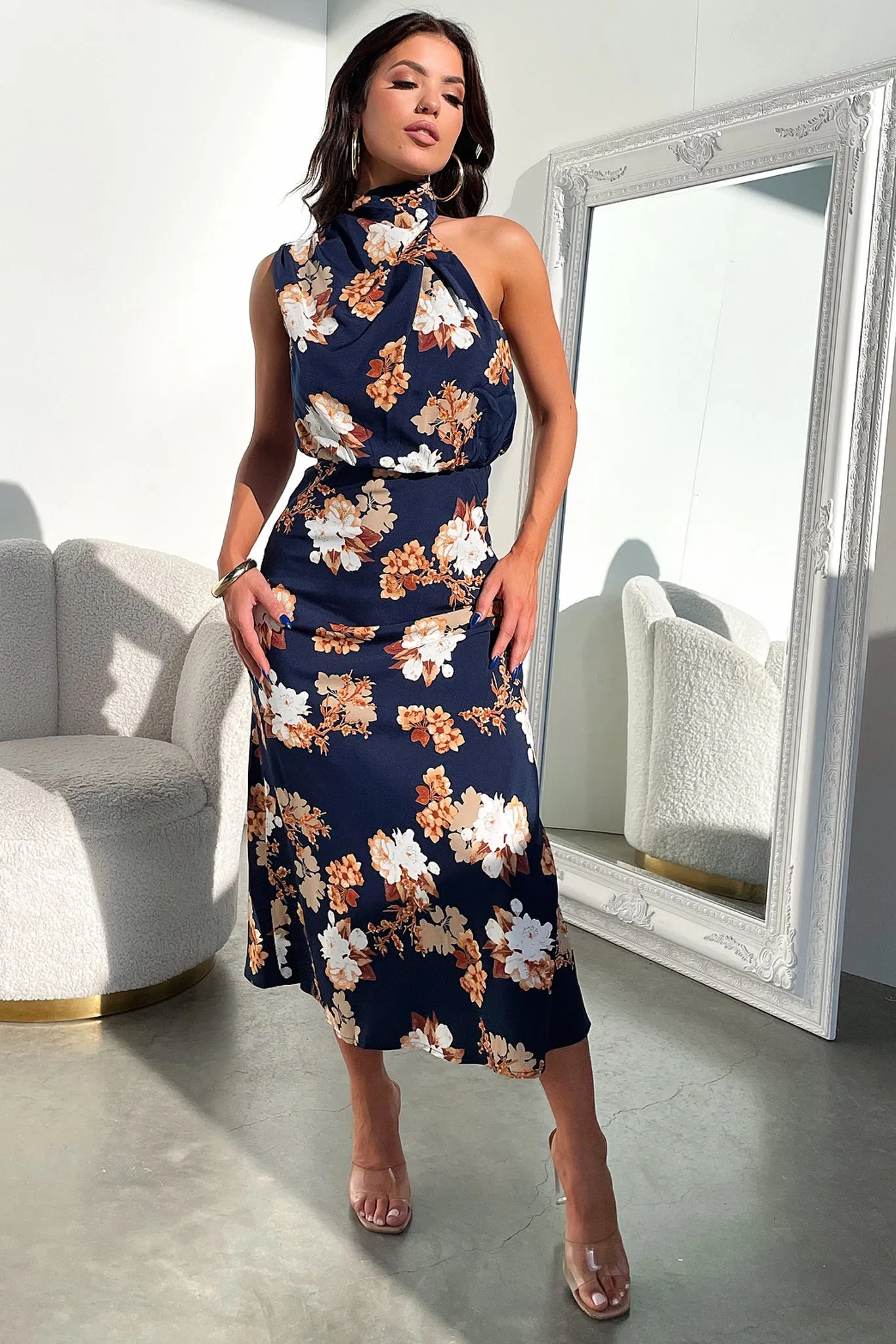 Santorini Maxi Dress - Navy Floral The simple yet stylish design of this maxi dress makes it an ideal choice for any occasion