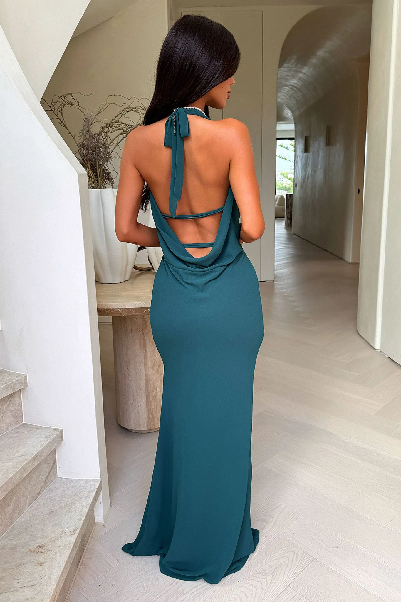 This dress is designed to be worn for a variety of occasions providing effortless style Amedeo Plunge Halter Neck Maxi Dress - Emerald