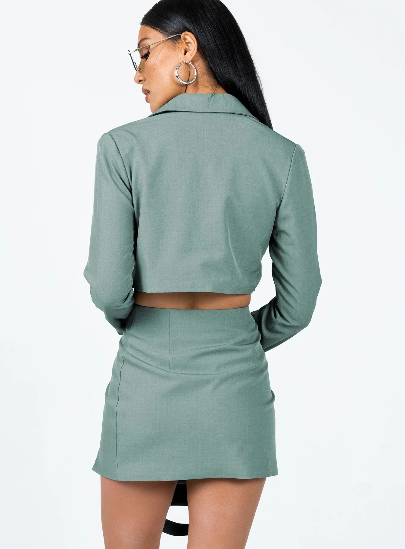 The Reggie Mini Skirt Slate Side Pockets Refined Edge