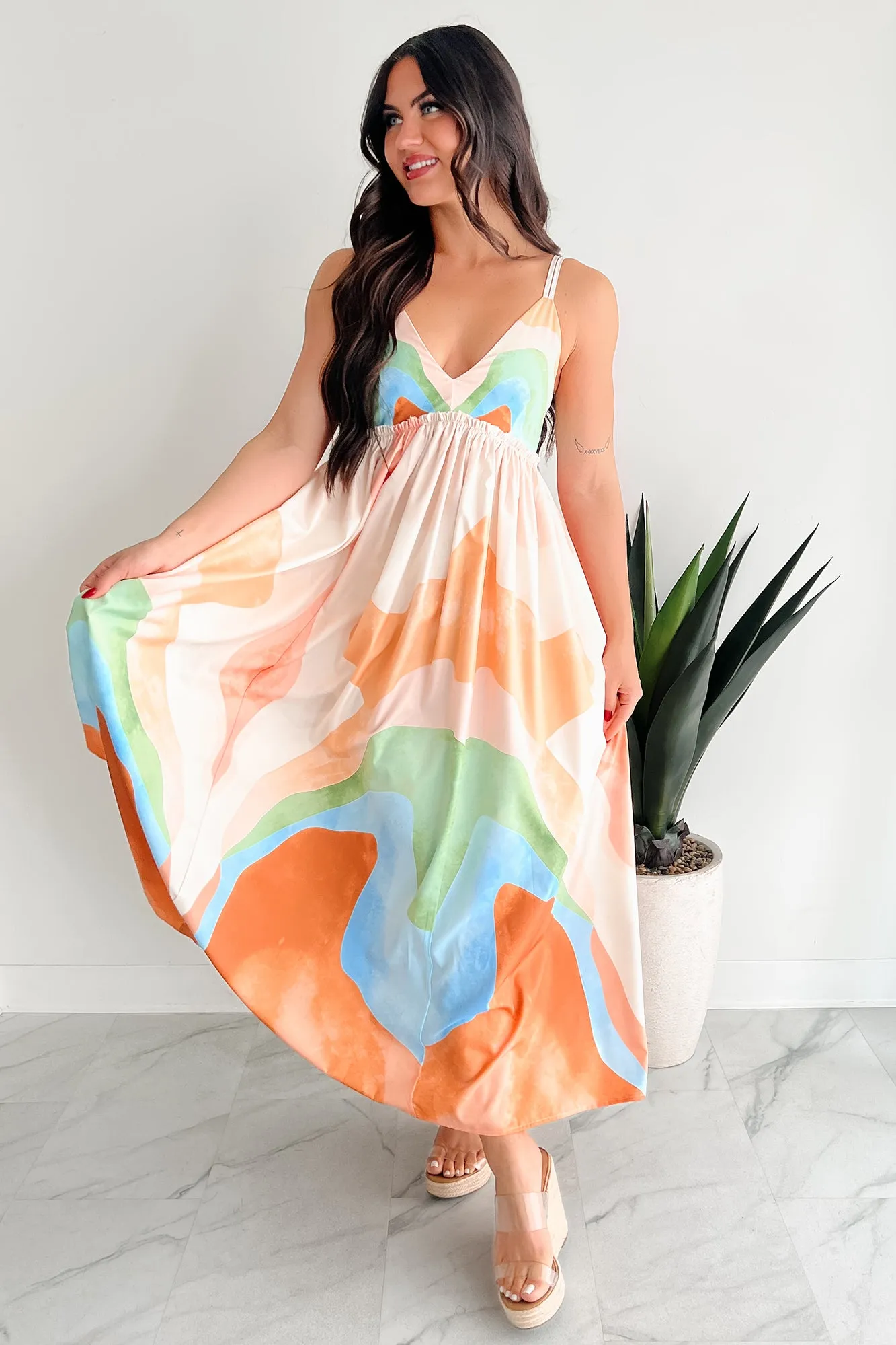 Tastefully Bold Printed Maxi Dress (Orange Combo) With its sophisticated design this dress will always remain a classic wardrobe piece Fashionable day-to-night gown