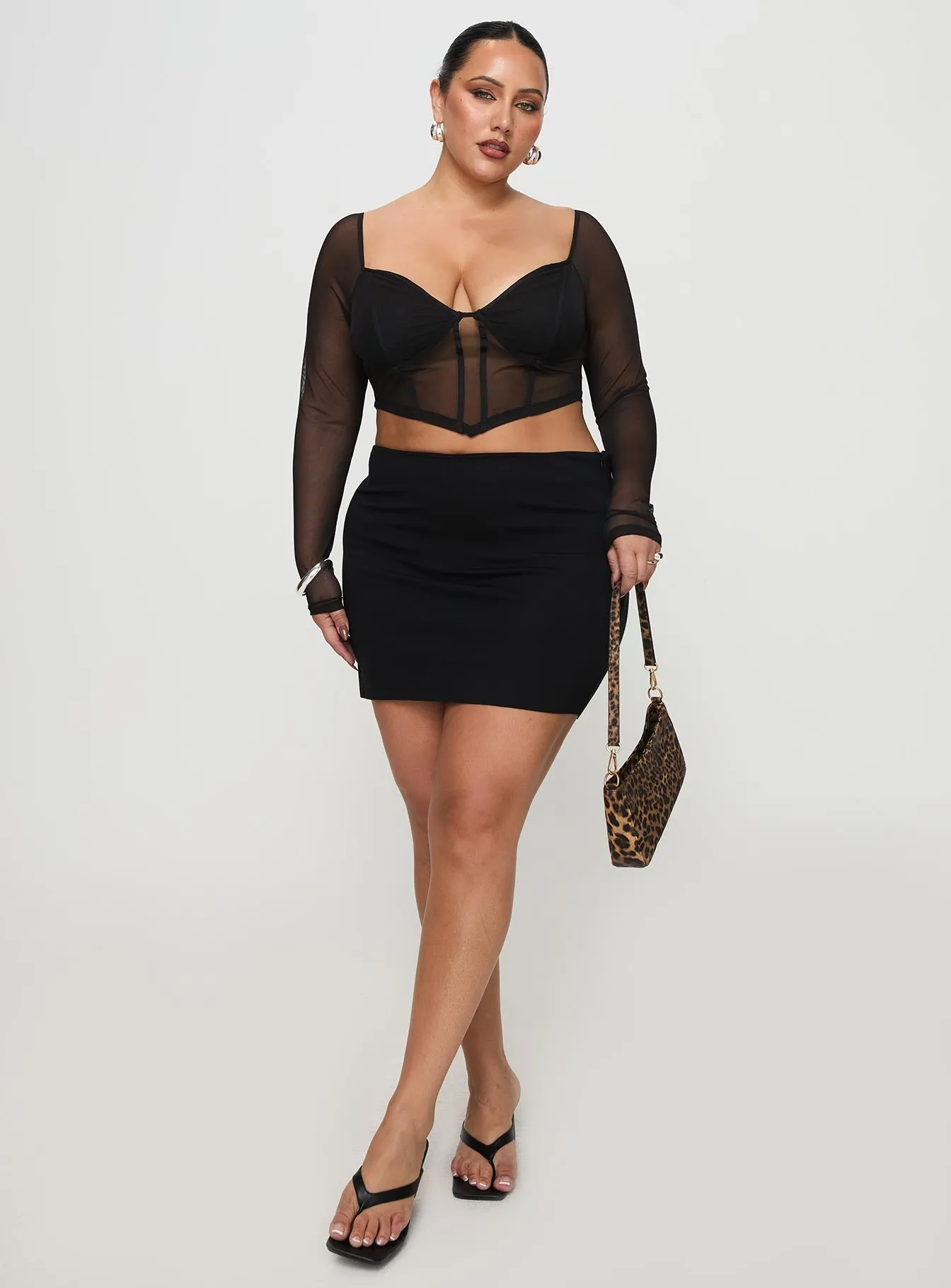 Karley Low Waist Mini Skirt Black Curve Statement Piece