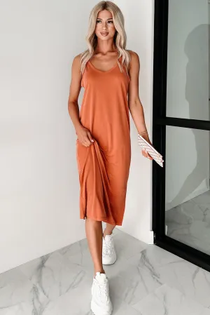 The elegant cut of this dress ensures you look chic and feel comfortable throughout the day Keeping It Real V Neck Midi Dress (Baked Clay)