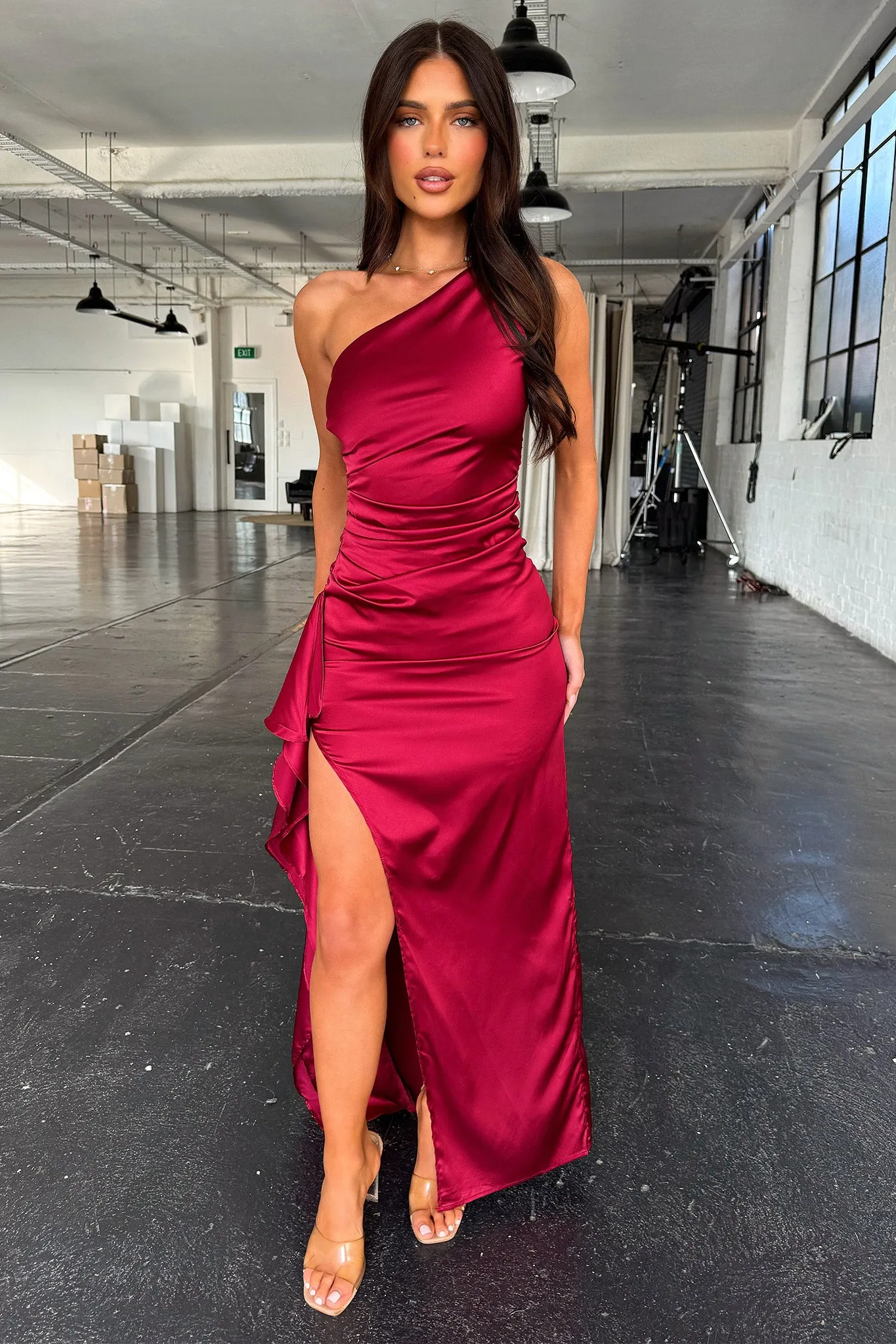 Elianna One Shoulder Satin Maxi Dress - Burgundy This dress offers a flattering shape that can easily be accessorized for a variety of looks